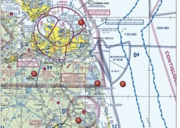 What hazards to aircraft may exist in restricted areas such as R-5302A? (Area 4)